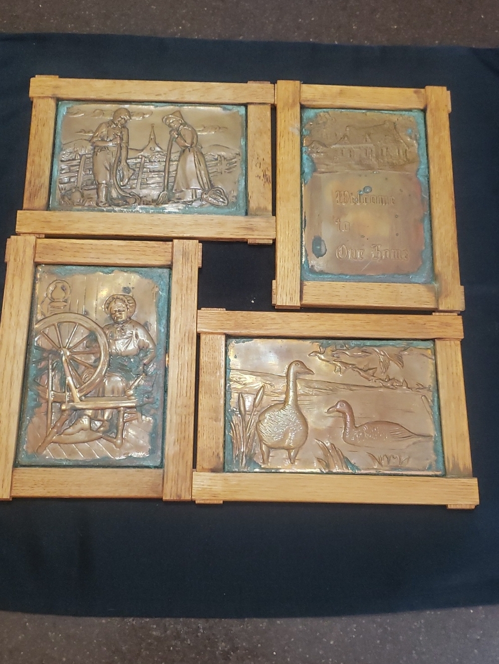 Vintage 1970s hand-embossed copper folk art wall plaques By Albert Nadeau.